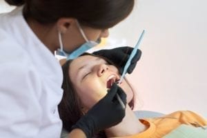 patient receiving sedation dentistry from her northeast philadelphia dentist